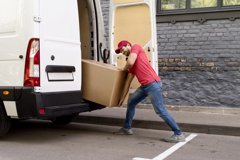 man loading packages
